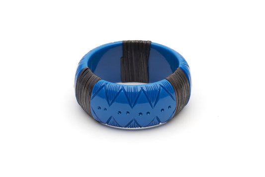 Splendette vintage inspired 1940s 1950s holiday vacation style carved blue fakelite Wide Pacific Dark Cane Bangle in smaller Maiden size.