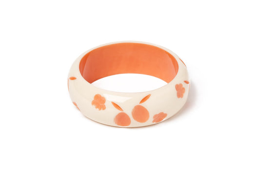 Splendette vintage inspired 1940s style carved peachy orange fakelite larger size Wide Apricot Cream Duchess Bangle
