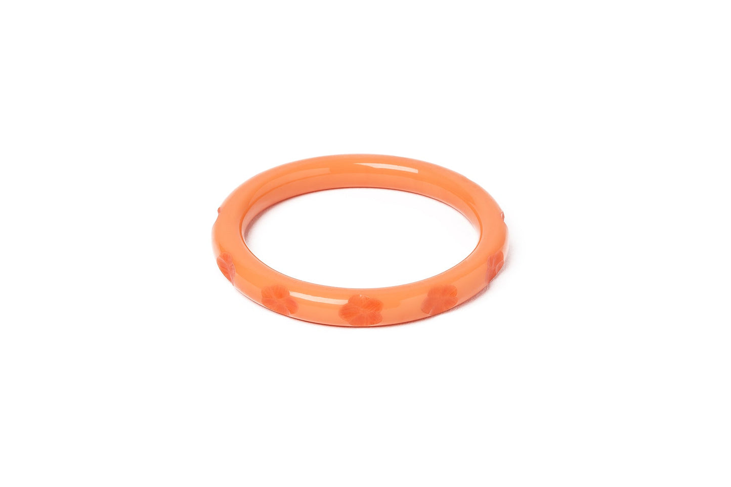Splendette vintage inspired 1940s style carved peachy orange fakelite smaller size Narrow Apricot Maiden Bangle
