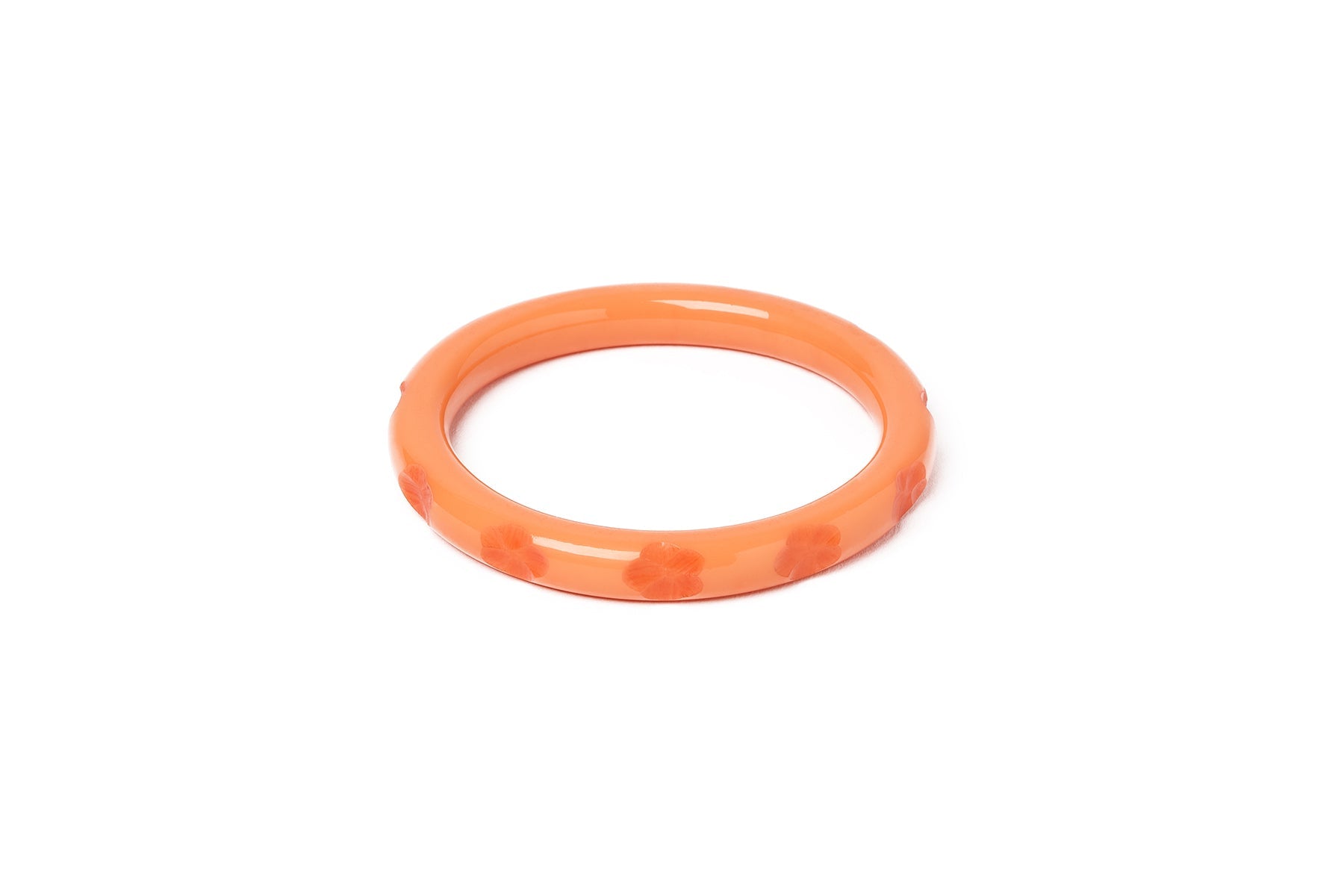 Splendette vintage inspired 1940s style carved peachy orange fakelite smaller size Narrow Apricot Maiden Bangle