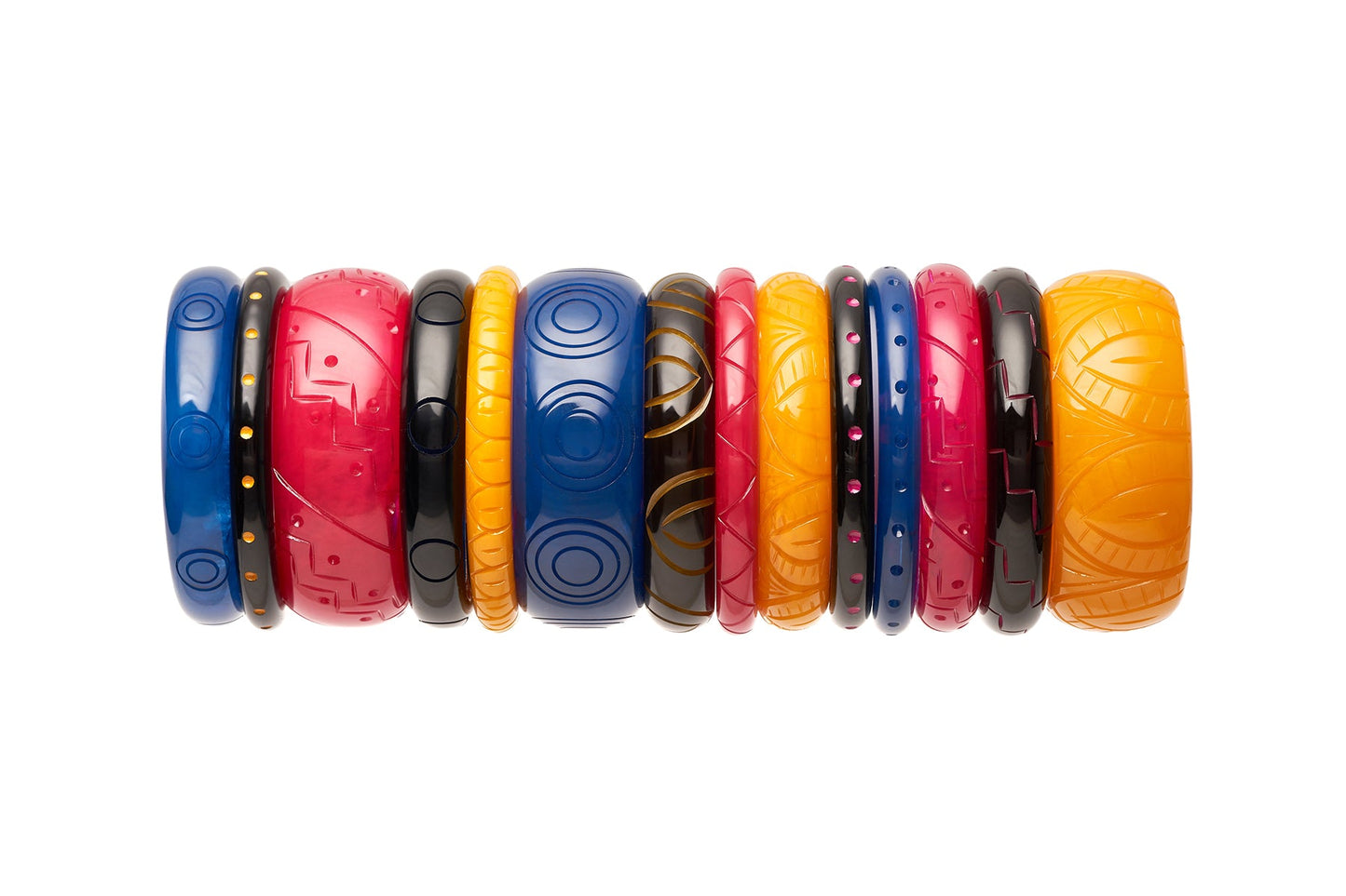 Splendette vintage inspired 1940s Bakelite style carved fakelite bangles in Bristol Blue, yellow Sand, pink Magenta with matching black bangles