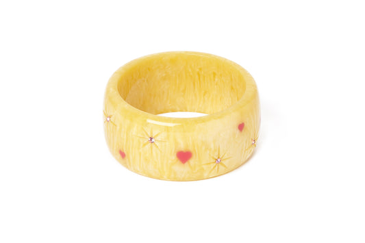 Splendette vintage inspired 1950s kitsch Valentine's style pastel yellow carved fakelite Extra Wide Honey Bunch Starburst Bangle