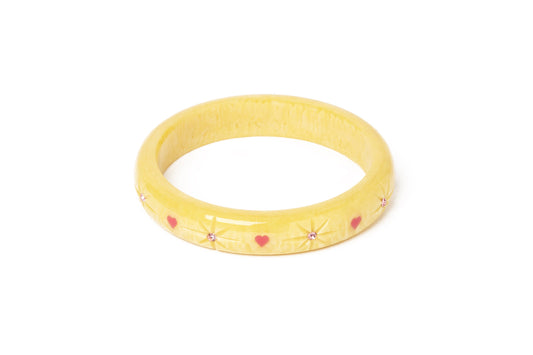 Splendette vintage inspired 1950s kitsch Valentine's style pastel yellow carved fakelite large size Midi Honey Bunch Starburst Duchess Bangle